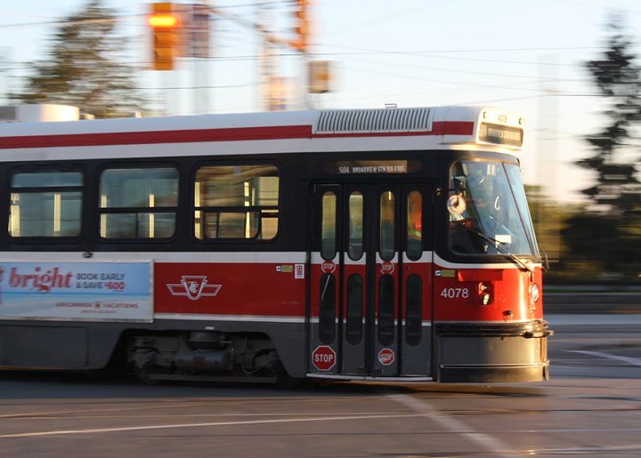 A TTC 504 streetcar is seen near Roncesvalles Avenue and The Queensway.