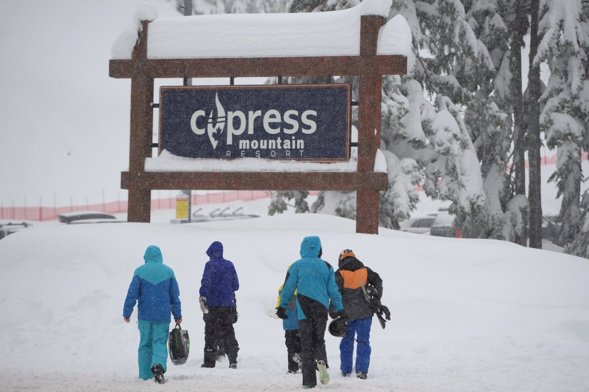People arrive at the Cypress Mountain resort in West Vancouver, Thursday, Dec. 29, 2016.  