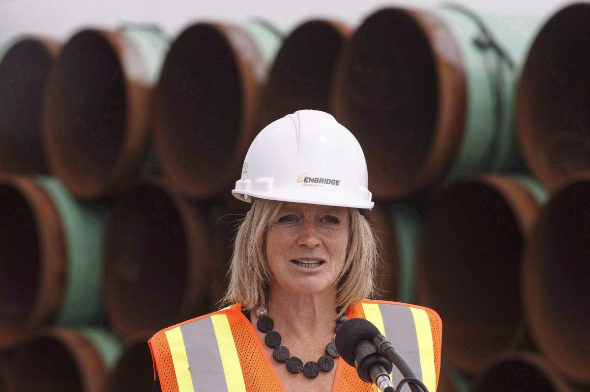 Alberta Premier Rachel Notley speaks to media during a tour of Enbridge's Line 3 pipeline replacement project in Hardisty, Alta., on Thursday Aug.10, 2017. Notley kicks off a cross-country speaking tour on the importance of the Trans Mountain pipeline expansion on Monday in Toronto. THE CANADIAN PRESS/Jason Franson.