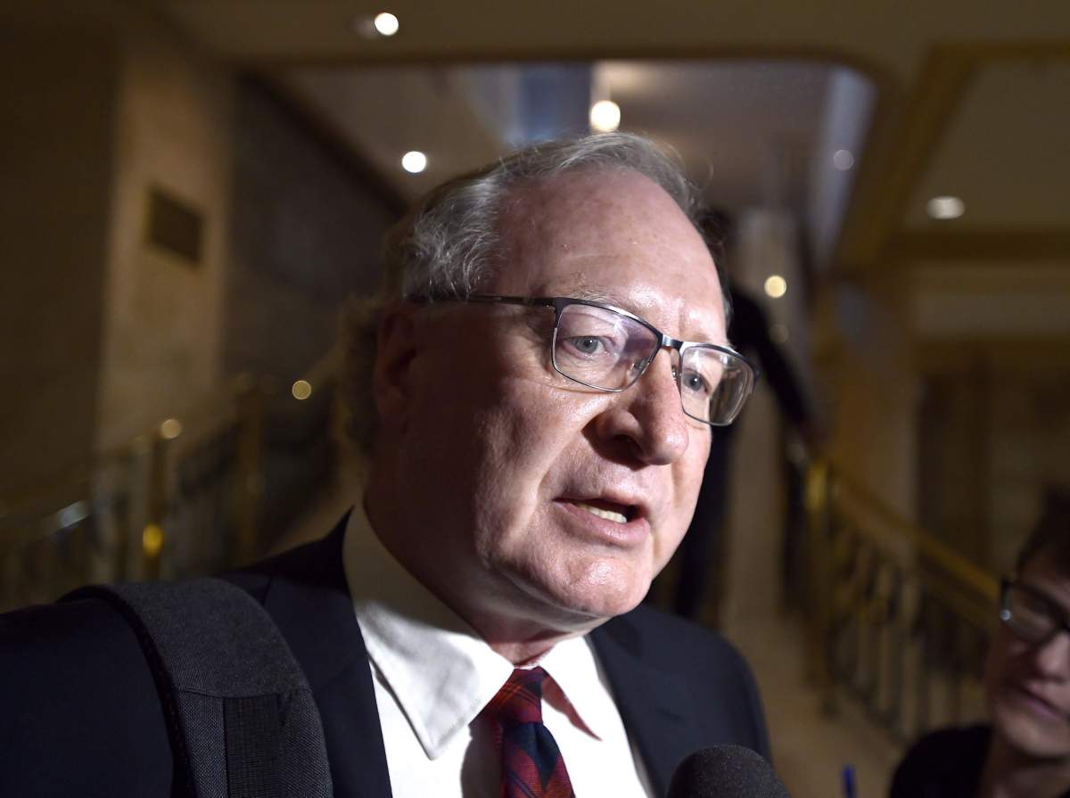 File - PEI Premier Wade MacLauchlan speaks to reporters following a Council of the Federation meeting in Ottawa on Tuesday, Oct. 3, 2017. 