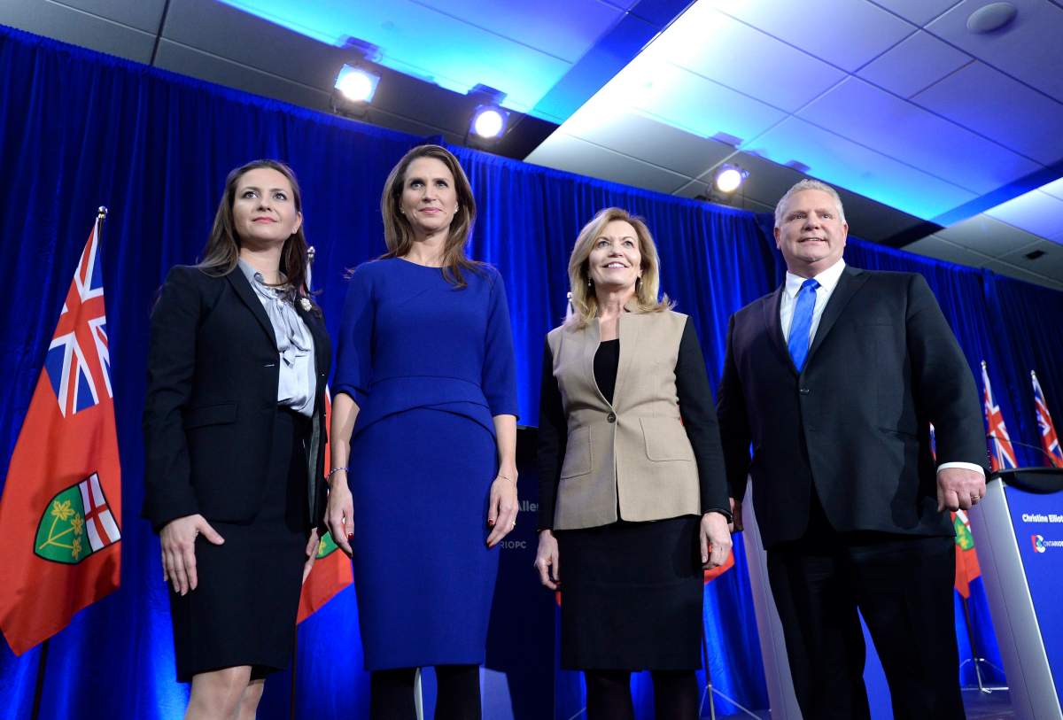 Ontario PC leadership candidates Tanya Granic Allen, Caroline Mulroney, Christine Elliott and Doug Ford pose for a photo after participating in a debate in Ottawa on Wednesday, Feb. 28, 2018.