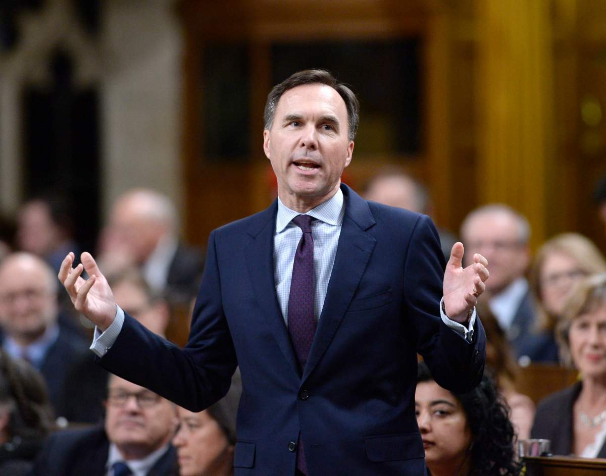Minister of Finance Bill Morneau rises during Question Period in the House of Commons on Parliament Hill in Ottawa on Thursday, March 1, 2018.