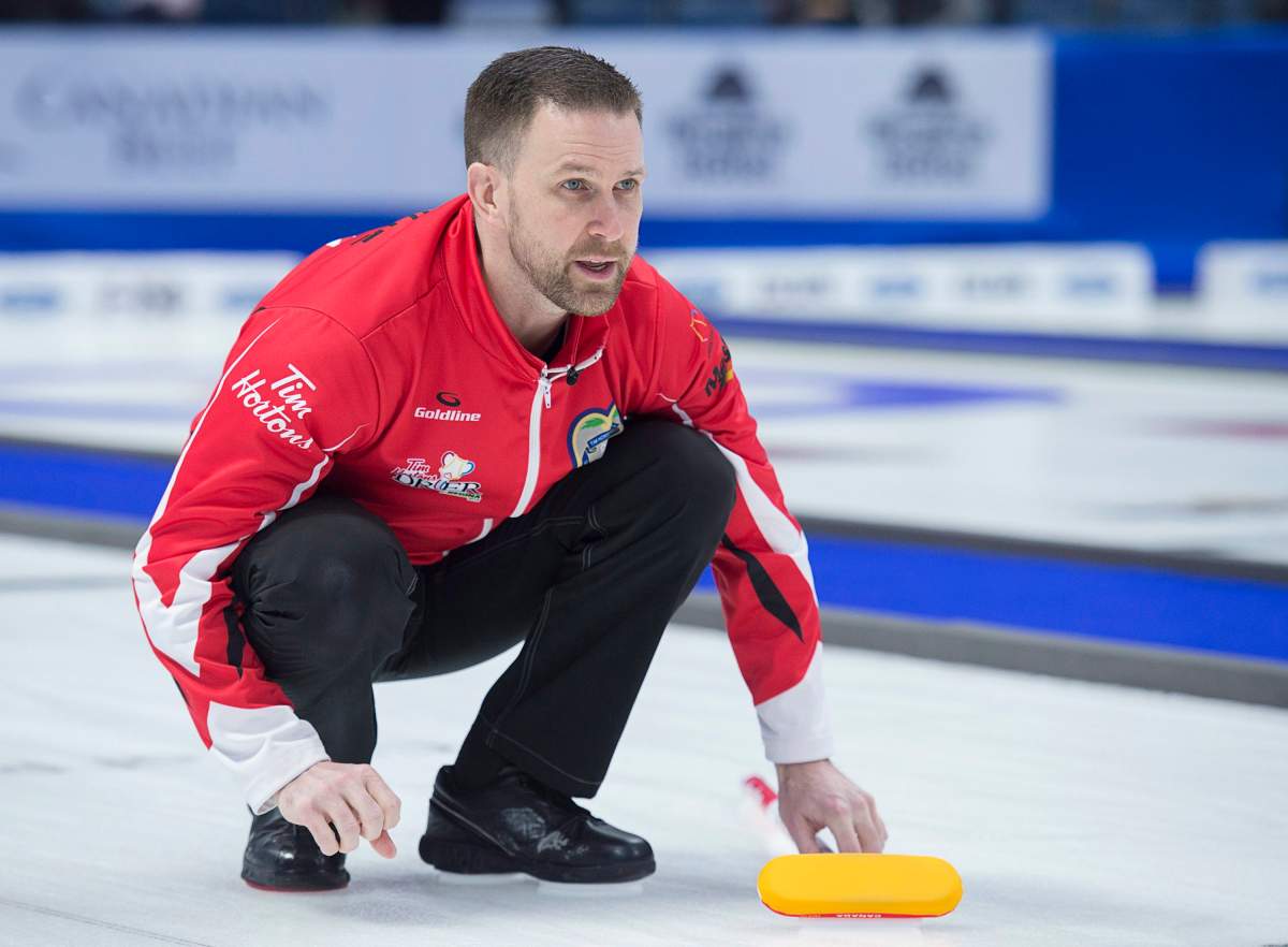 Team Canada skip Brad Gushue watches a rock as they play Alberta in the Tim Hortons Brier championship game at the Brandt Centre in Regina on Sunday, March 11, 2018.