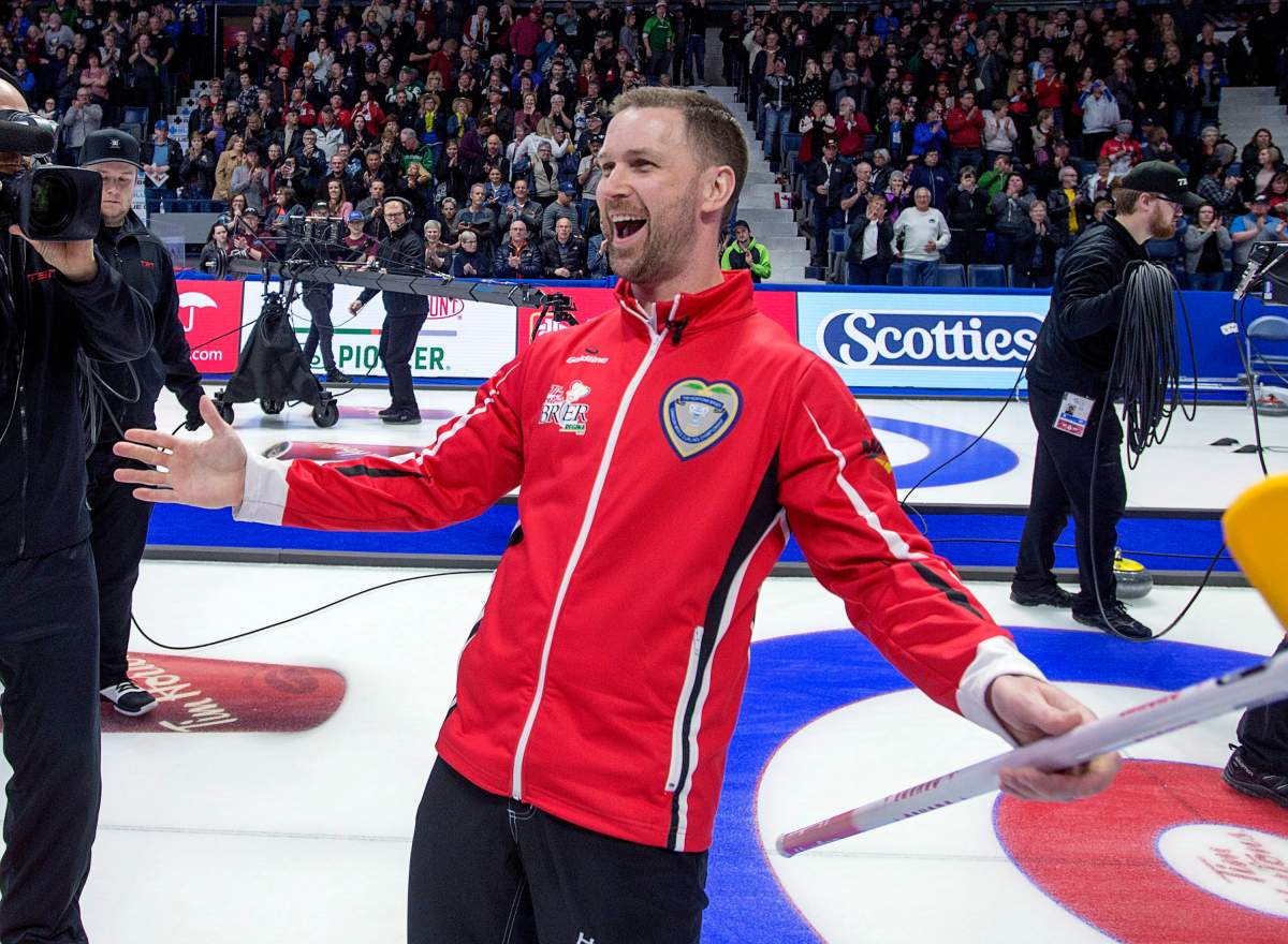 Team Canada skip Brad Gushue celebrates after defeating Alberta 6-4 to win the Tim Hortons Brier at the Brandt Centre in Regina on Sunday, March 11, 2018.