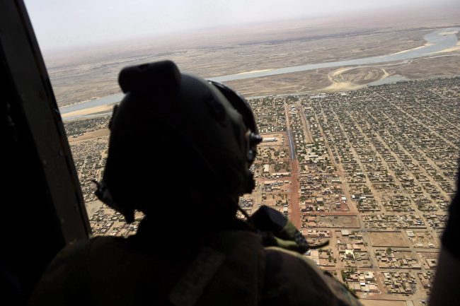 A French soldier stands inside a military helicopter in Gao, northern Mali, May 19, 2017. 