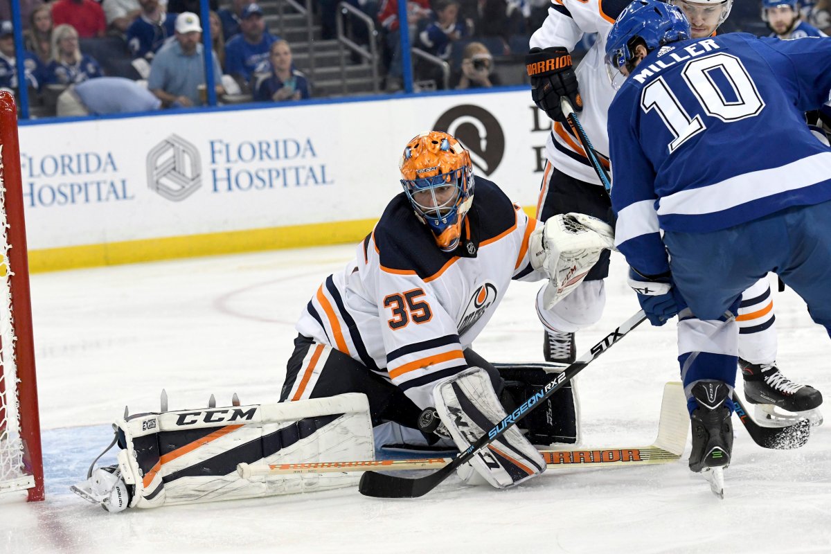 Edmonton Oilers goaltender Al Montoya (35) makes a save on a shot from Tampa Bay Lightning centre J.T. Miller (10) during the second period of an NHL hockey game Sunday, March 18, in Tampa, Fla.