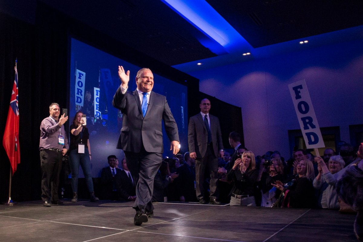 Ontario PC Party Leader Doug Ford takes to the stage as he holds a unity rally in Toronto on Monday, March 19, 2018. 