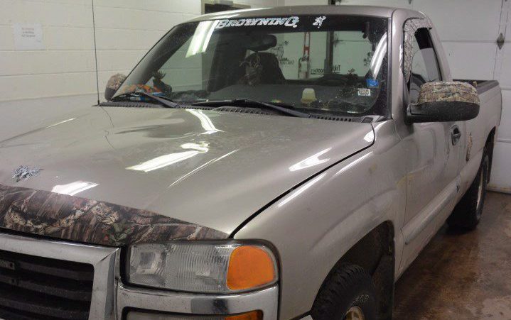 A grey 2003 GMC Sierra 4 X 4 pickup truck is shown in this RCMP handout image. Police have released pictures of a truck suspected to have been involved in a fatal hit-and-run death that has left a New Brunswick First Nation grieving and seeking justice. 