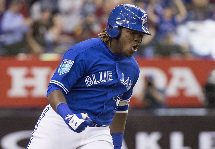 Toronto Blue Jays' Vladimir Guerrero Jr. celebrates his walk-off homerun to defeat the St. Louis Cardinals 1-0 during ninth inning spring training baseball action Tuesday, March 27, 2018 in Montreal. 