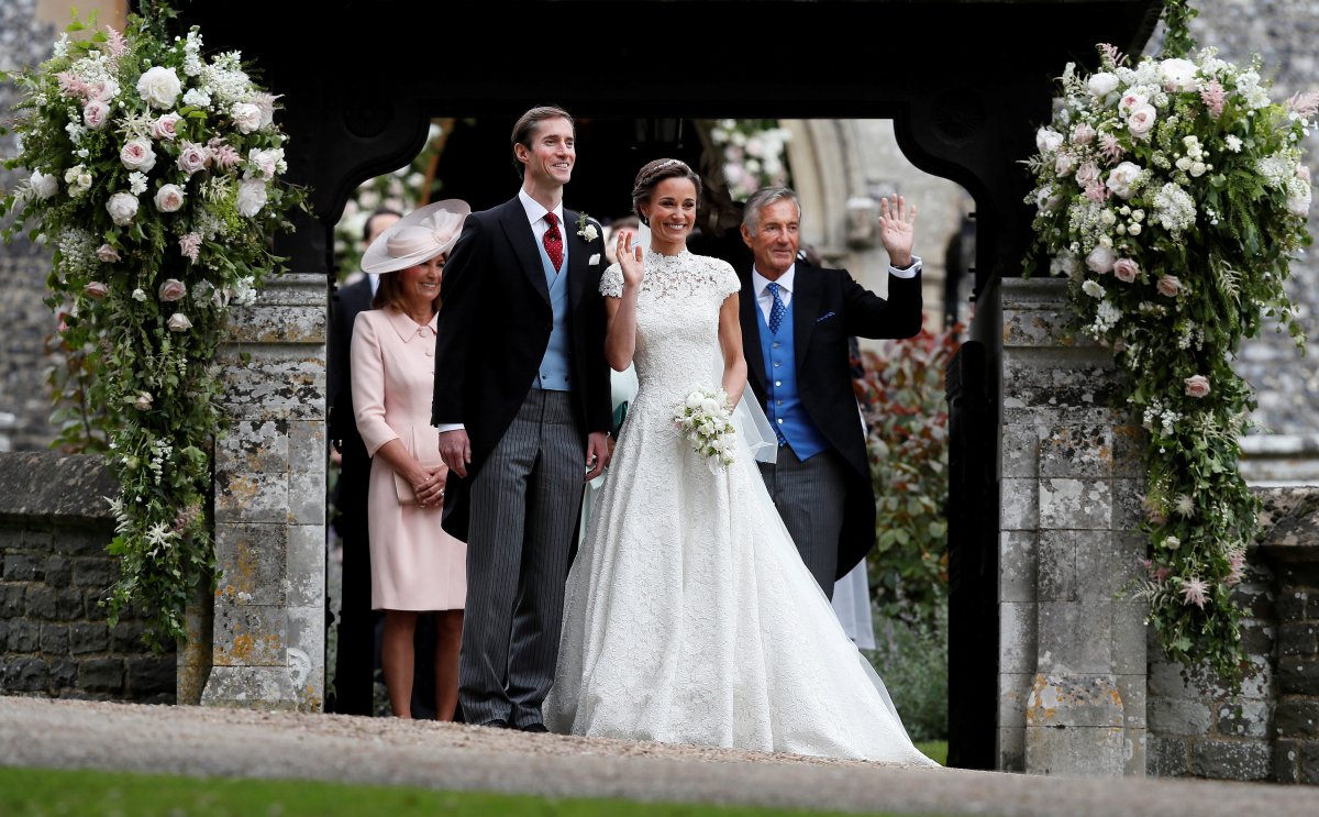 David Matthews (right) waves to well-wishers at the wedding of his son James Matthews and Pippa Middleton at St Mark's Church in Englefield, Britain, May 20, 2017.
