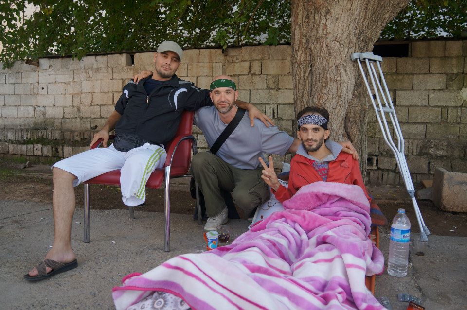 U.S. photojournalist Matthew Schrier, centre, was abducted by the al-Qaida faction in Syria on Dec. 31, 2012, and held for seven months.