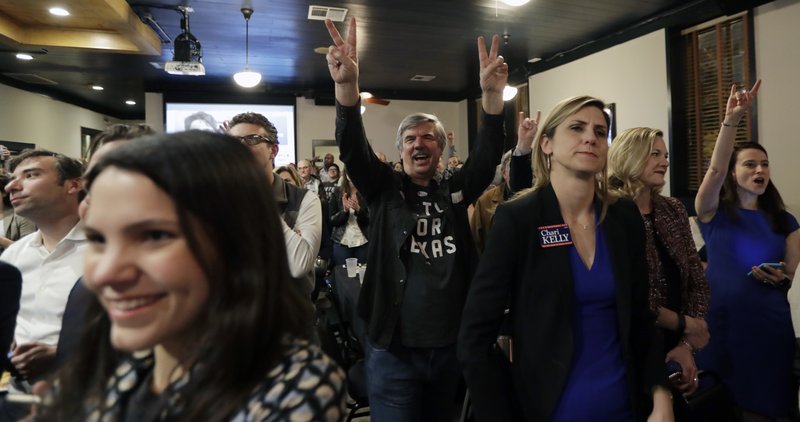 Supporters of U.S. Senate hopeful Beto O’Rourke cheer during a Democratic watch party following the Texas primary election, Tuesday, March 6, 2018, in Austin, Texas.