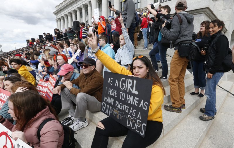 Thousands of protesters flood the Utah State Capitol on Saturday, March 24, 2018, in Salt Lake City, seeking stronger gun-control measures in response to last month’s school shooting in Parkland, Fla. (AP Photo/Rick Bowmer)