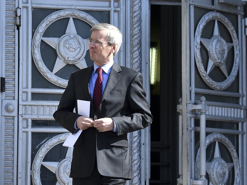 British ambassador to Russia, Laurie Bristow, leaves after a meeting at the Russian foreign ministry building in Moscow, Russia, Friday, March 30, 2018. 