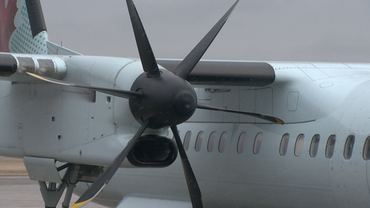 Too much de-icing fluid was likely the cause of an engine tailpipe fire on an Air Canada Express flight from Saskatoon to Calgary.