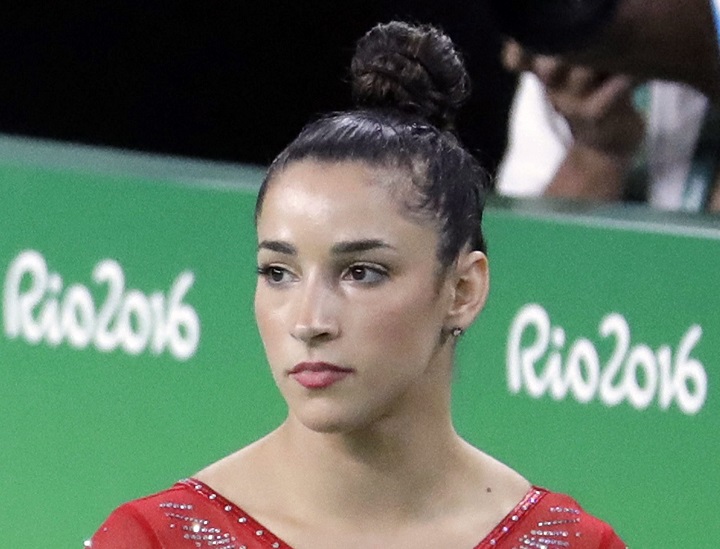 Gymnast Aly Raisman,  seen above at the Rio Summer Games in this 2016 file photo, is suing the U.S. Olympic Committee and USA Gymnastics over the Larry Nassar abuse scandal.