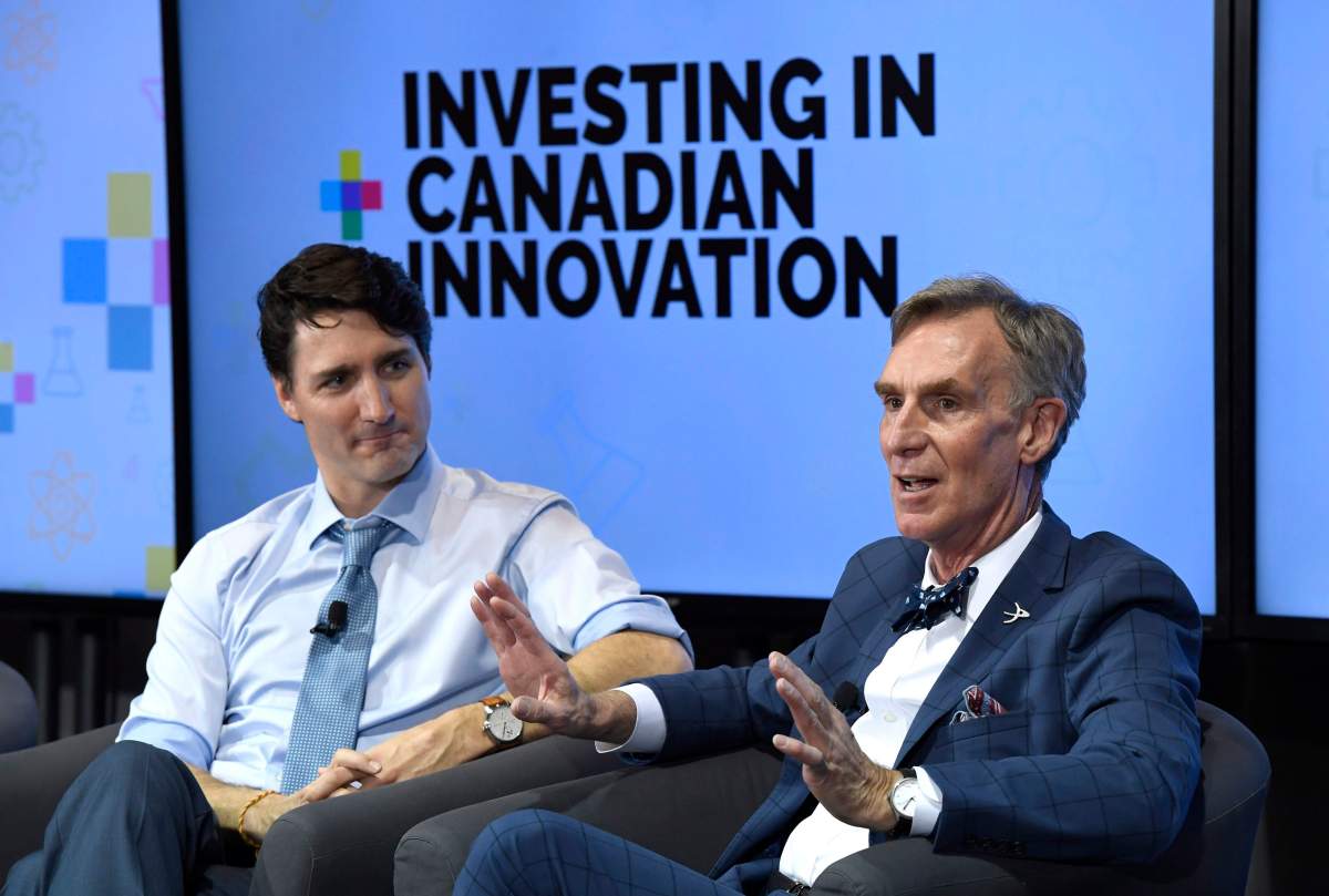 Prime Minister Justin Trudeau looks on as he participates in an armchair discussion with Bill Nye, right, highlighting Budget 2018’s investments in Canadian innovation at the University of Ottawa in Ottawa on Tuesday, March 6, 2018.