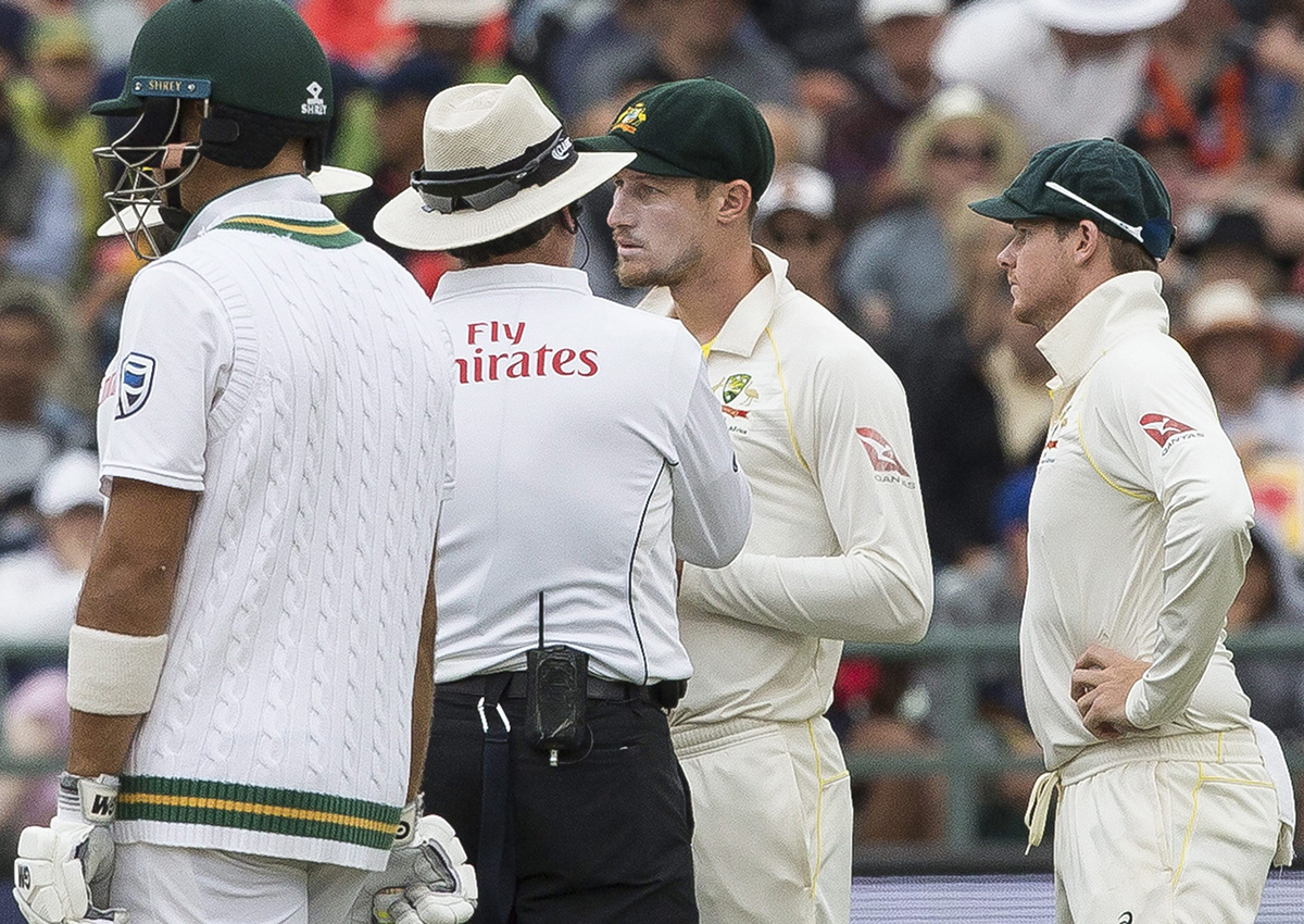 Cameron Bancroft of Australia talks to the umpire on the third day of the third cricket test between South Africa and Australia at Newlands Stadium, in Cape Town, South Africa, Saturday, March 24, 2018.