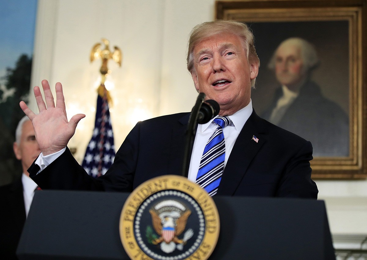 In this March 23, 2018, photo, President Donald Trump speaks in the Diplomatic Room of the White House in Washington. 