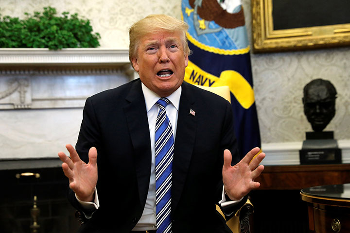 U.S. President Donald Trump speaks in the Oval Office of the White House in Washington, March 5, 2018. 