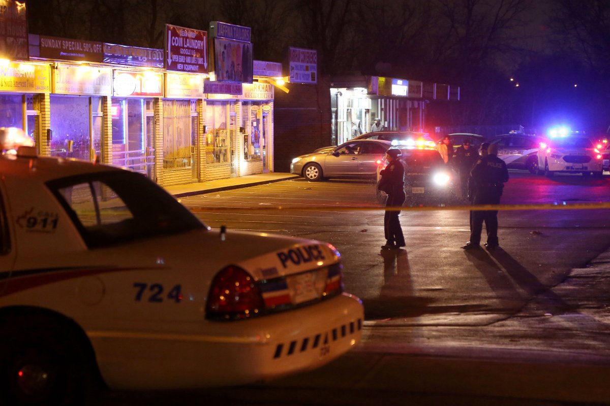 Police investigate the scene of a stabbing in Toronto on March 13, 2018.