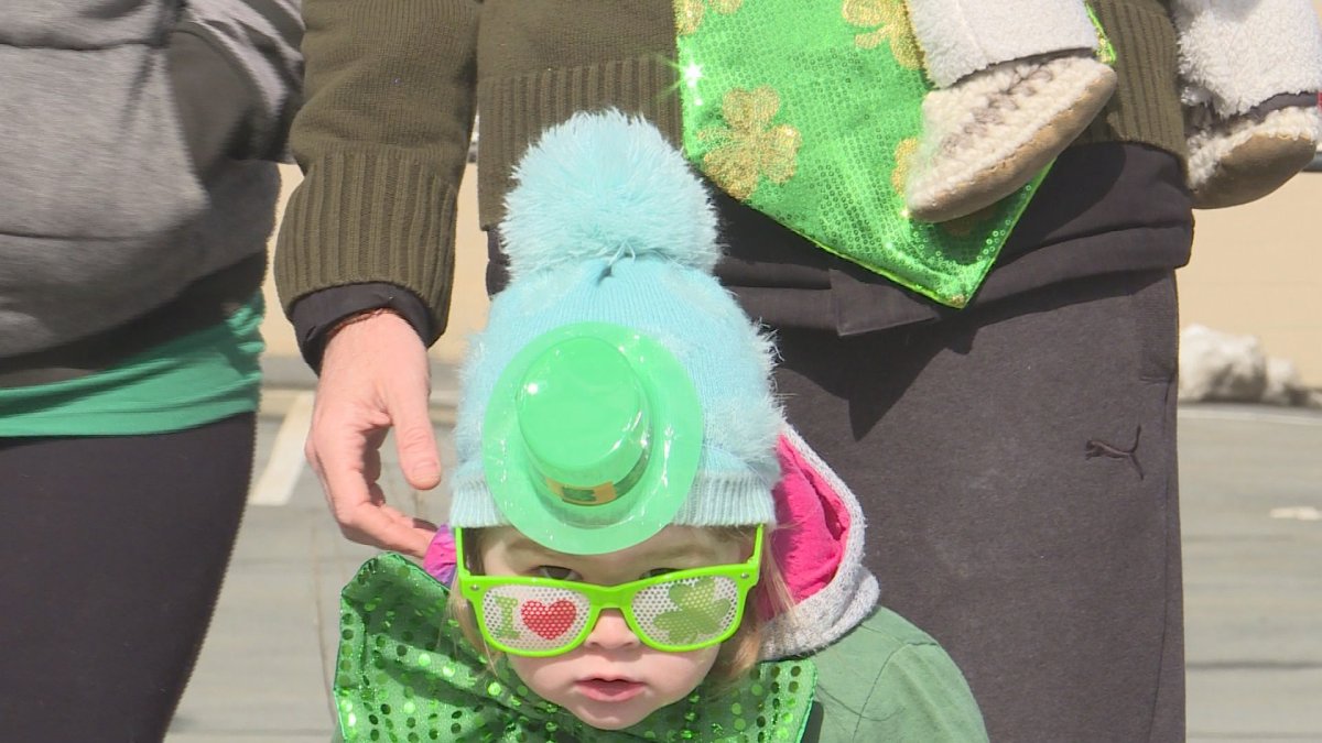 A child takes in the St. Patrick's Day Parade in Halifax on March 11, 2017.