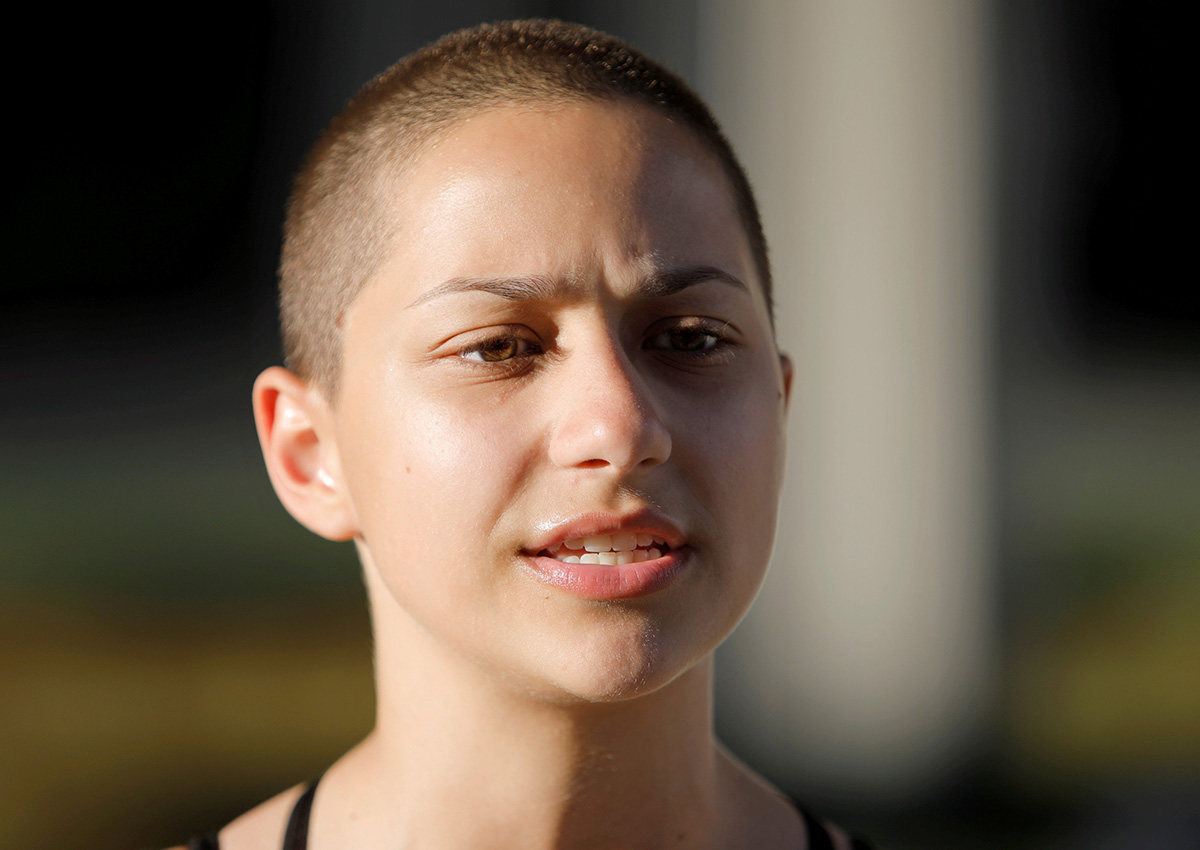 Emma Gonzalez, a senior at Marjory Stoneman Douglas High School, speaks to the media after calling for more gun control at a rally three days after the shooting at her school, in Fort Lauderdale, Florida, U.S., February 17, 2018.