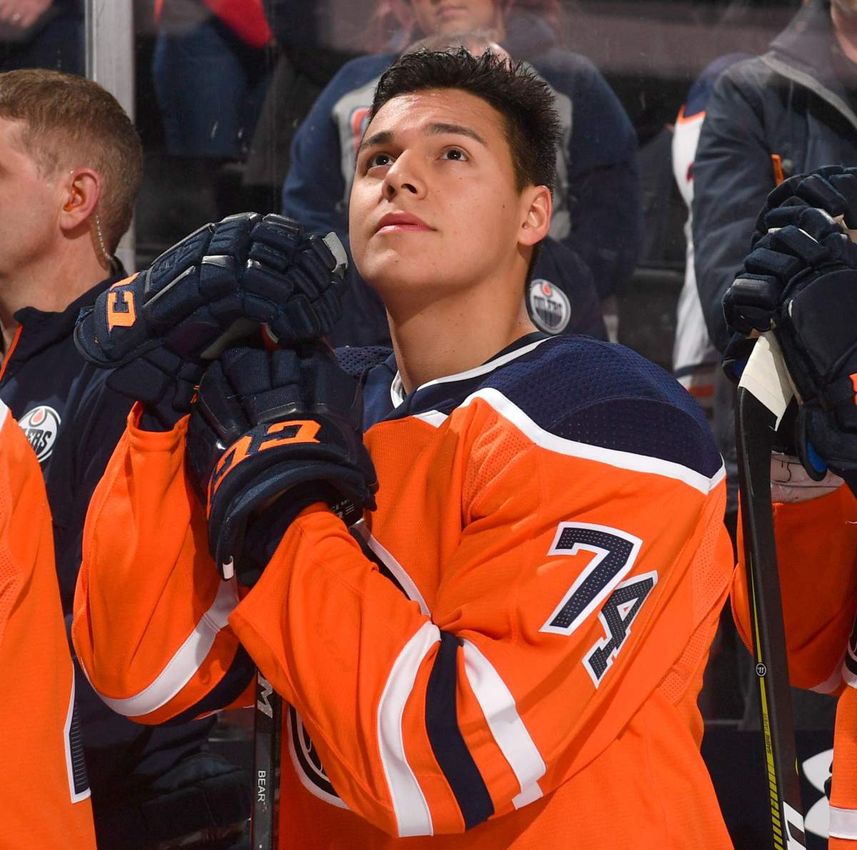 Ethan Bear #74 of the Edmonton Oilers stands for the singing of the national anthem prior to the game against the Nashville Predators on March 1, 2017 at Rogers Place in Edmonton, Alberta, Canada.