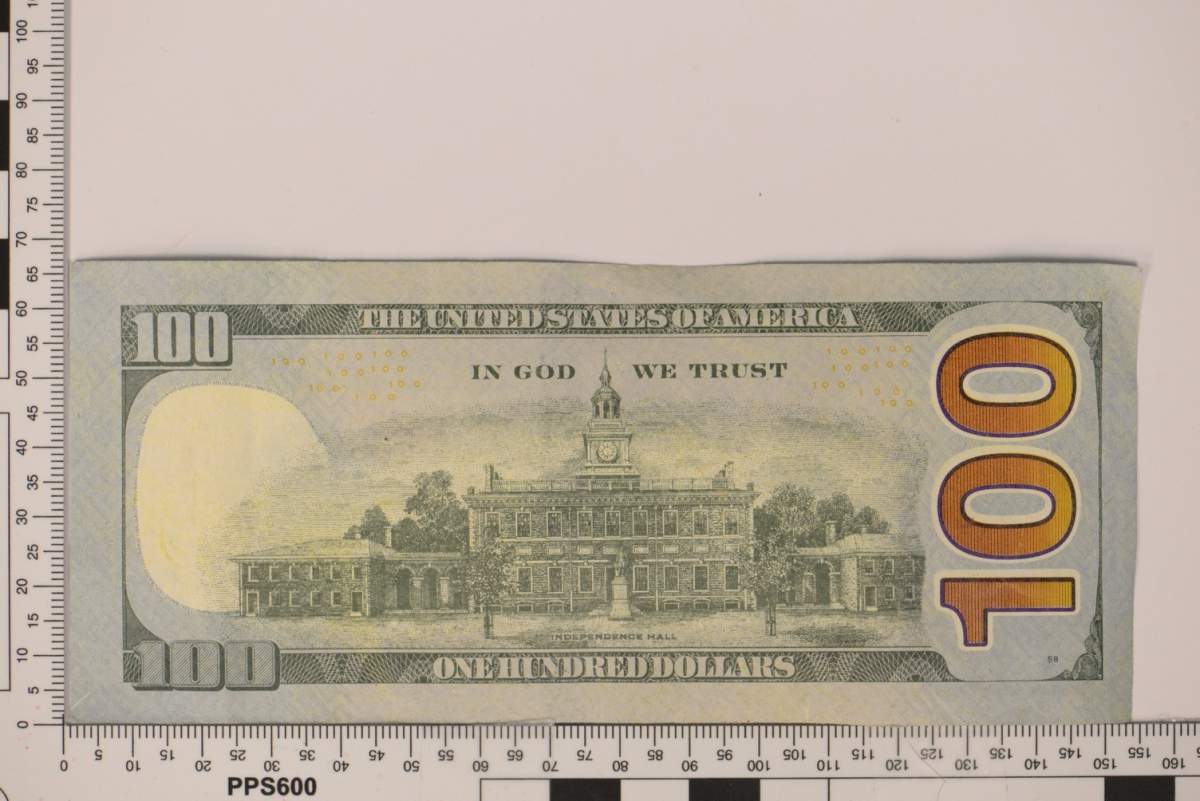 Police remind businesses to check for security features on currency.