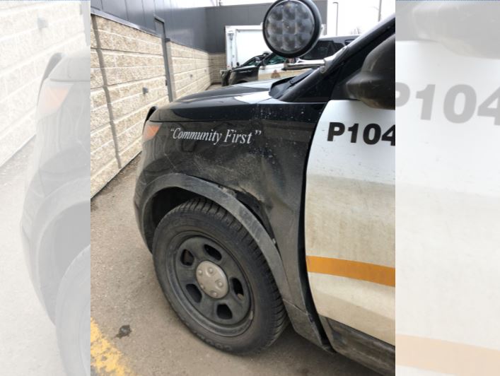 The Brandon police car was hit in the front of the vehicle by a stray tire.