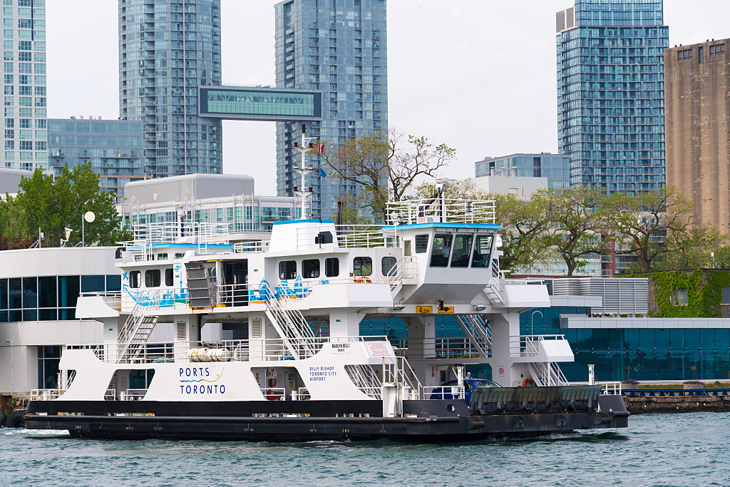 Ferry carrying passengers to Billy Bishop airport from Bathurst Street. The ferry ride to and from Billy Bishop Airport is one of the shortest in the world at just 121 metres.