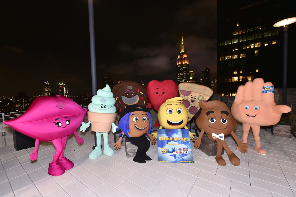 Empire State Building Lighting With Cast Of The Emoji Movie, Girls Who Code And Oath For Good For World Emoji Day at The Empire State Building on July 17, 2017 in New York City.
