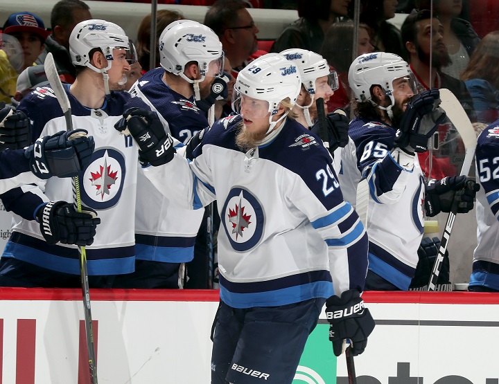 Patrik Laine of the Winnipeg Jets celebrates his first-period goal against the Carolina Hurricanes on March 4, 2018 at PNC Arena in Raleigh, North Carolina.