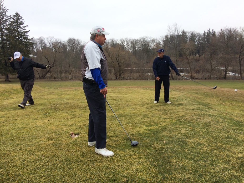 From left to right, John Bracken, Murray Clark, and Dirk DeVries prepare for their first tee-off at the Thames Valley Golf Club in March of 2017.