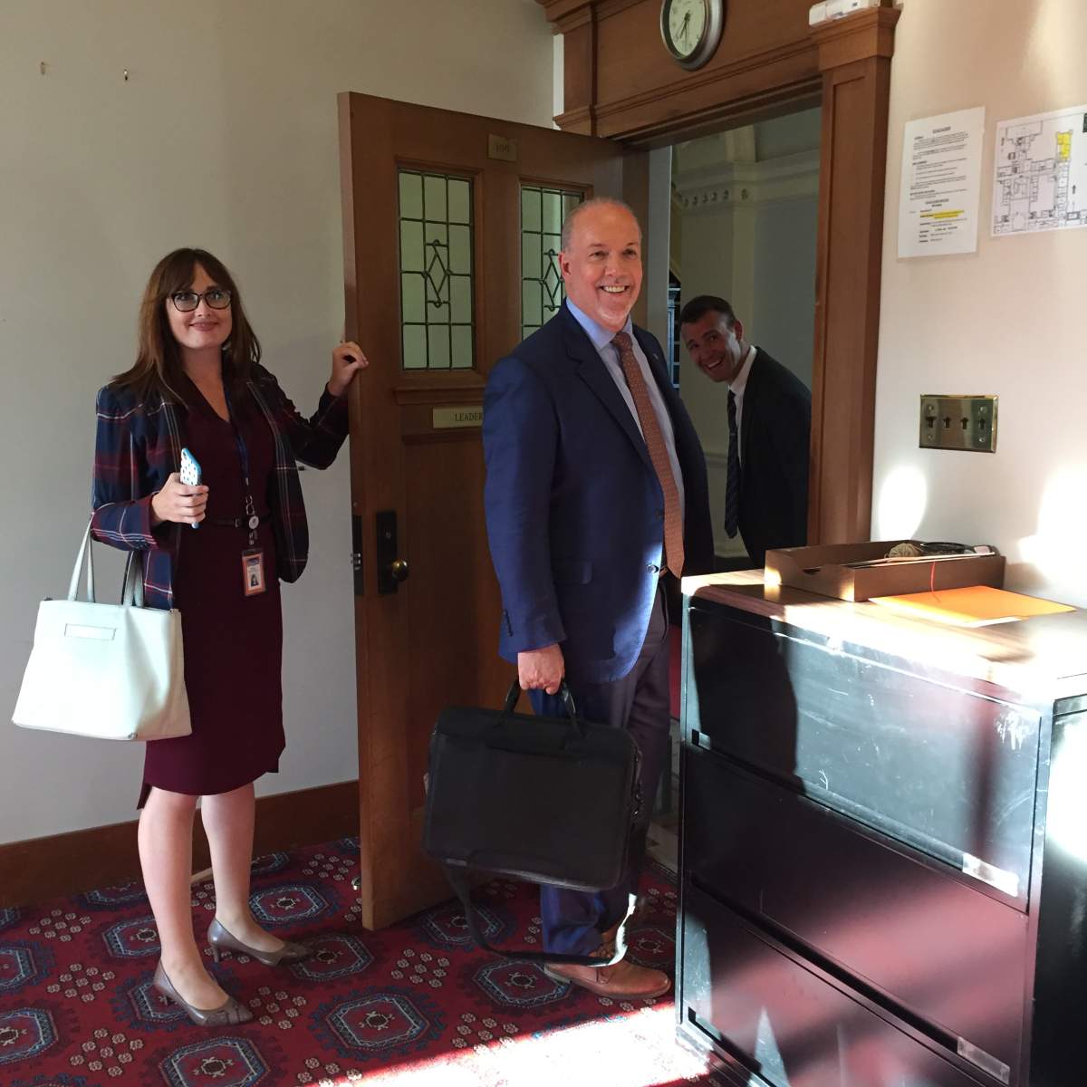 NDP leader John Horgan was all smiles when he left the B.C. Legislature on June 2.