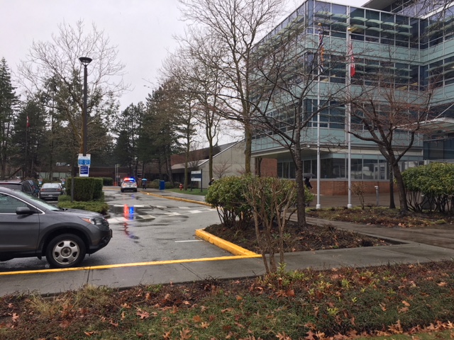 An RCMP SUV outside the Canada Revenue Agency office in Surrey.