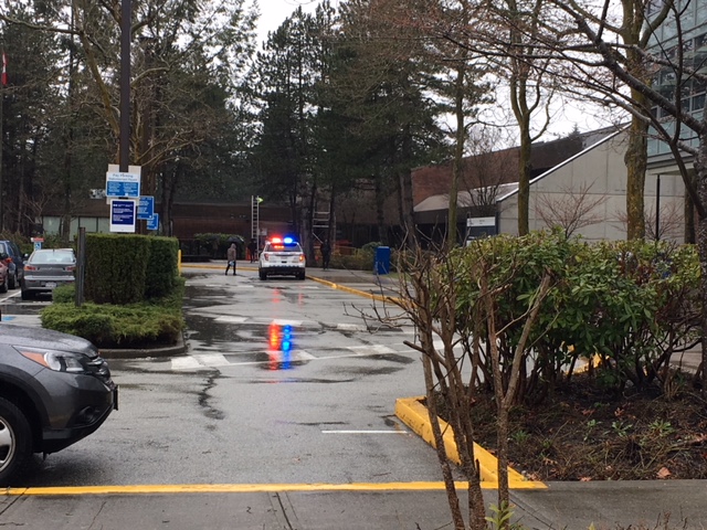 An RCMP SUV outside the Canada Revenue Agency office in Surrey.