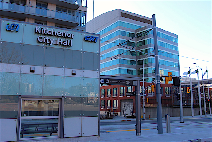 The Kitchener City Hall ION LRT station on Duke Street West in front of city hall.