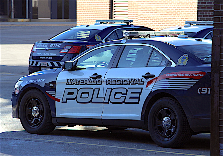 Waterloo Regional Police Service cruisers behind the Kitchener station.