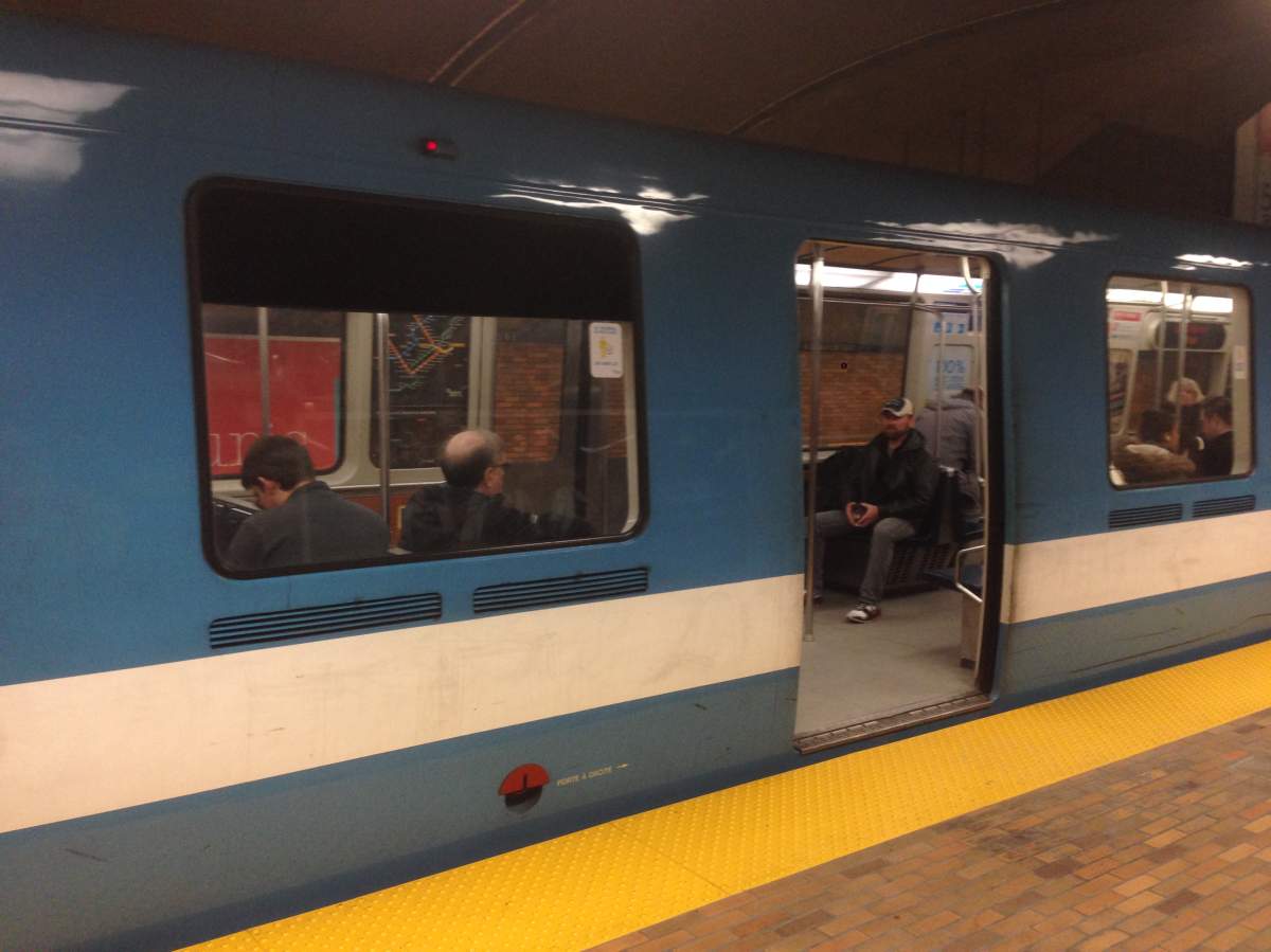 A train pulls into a Montreal Metro station.