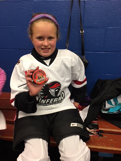 Eight-year-old Rylee Lyseng is a big Calgary Flames fan.