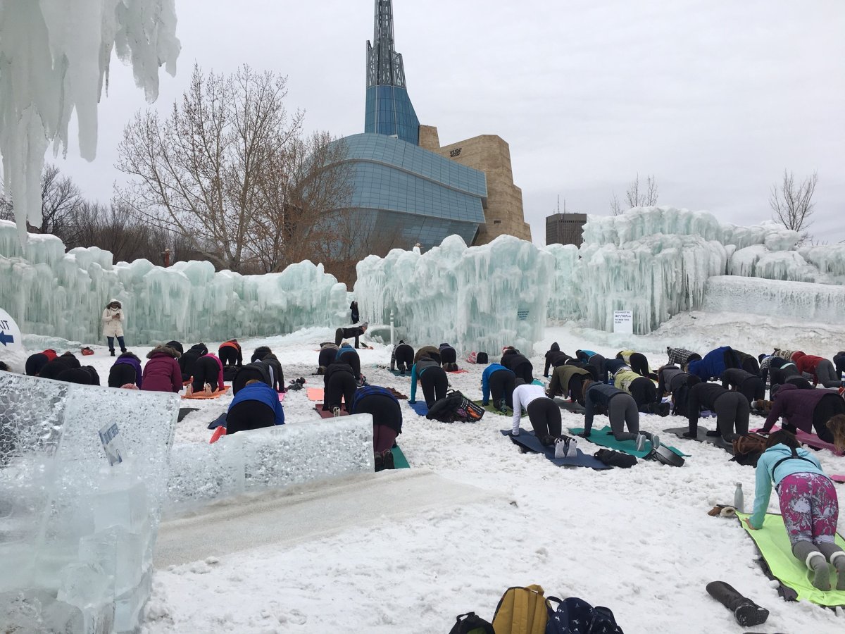 Winnipeggers embrace the cold weather inside of the ice castle at The Forks. 