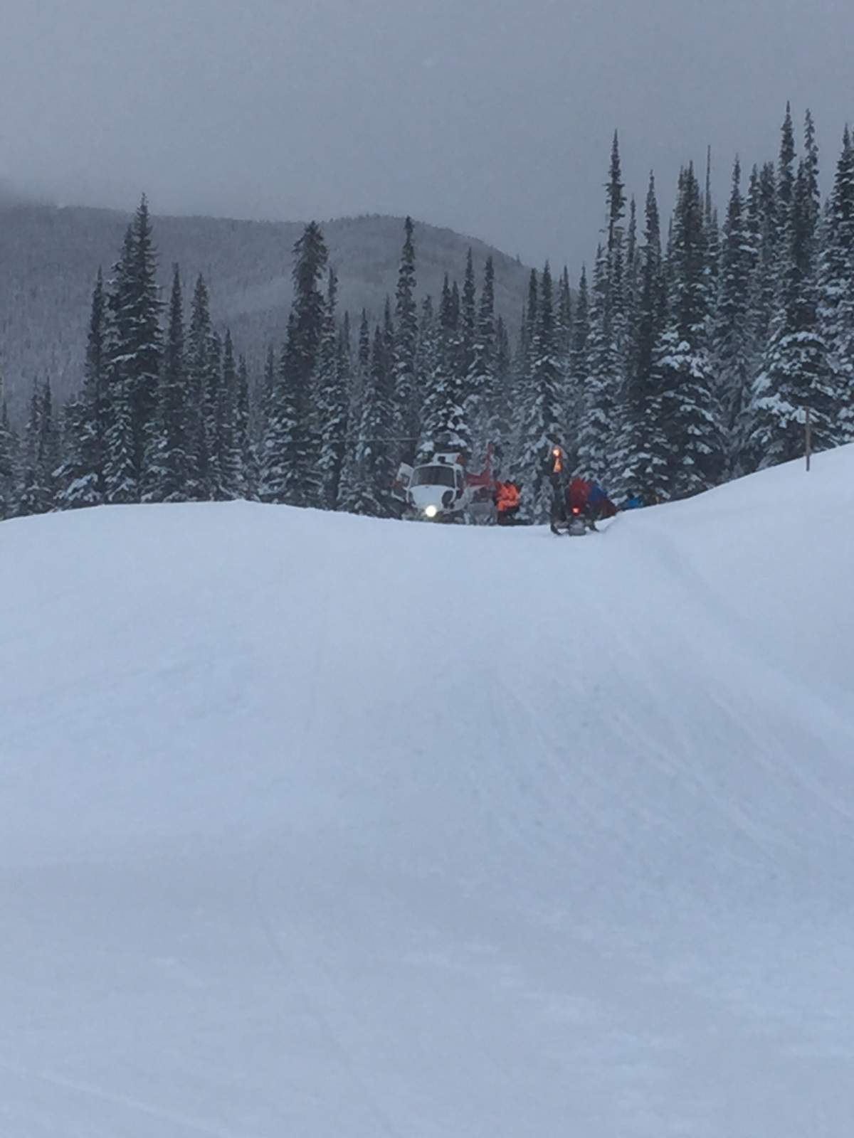 A helicopter was called to take a man to hospital after he was buried by an avalanche near Apex Ski Resort. 