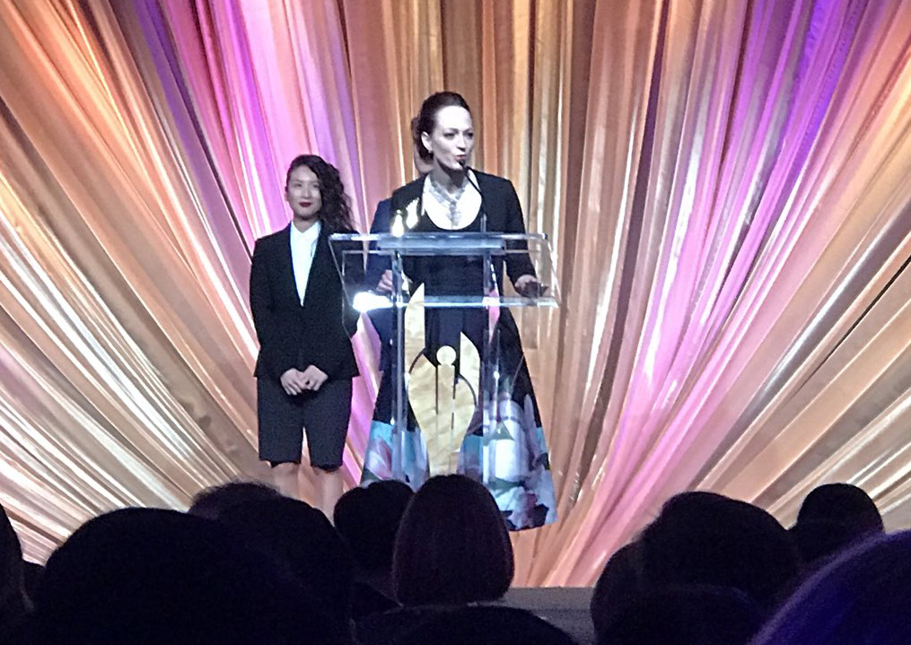 Global News' Carolyn Jarvis collects the award.