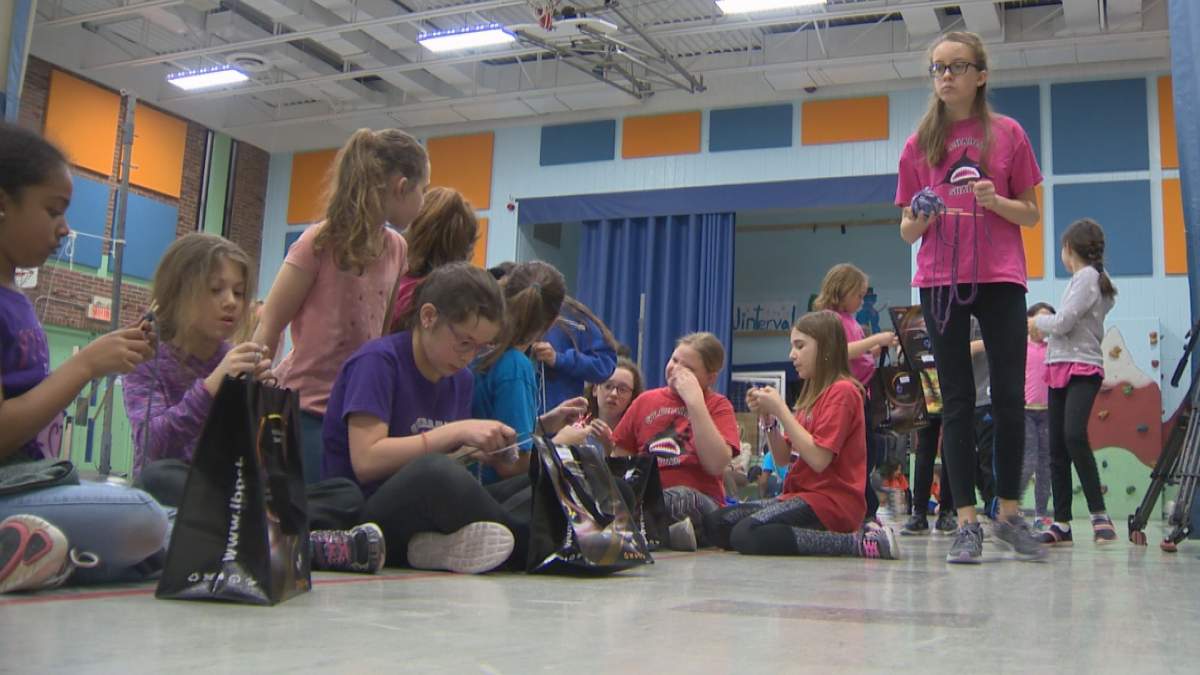 The St. Charles Knitting Club weaves tuques and scarves for hospitals and other charities. 