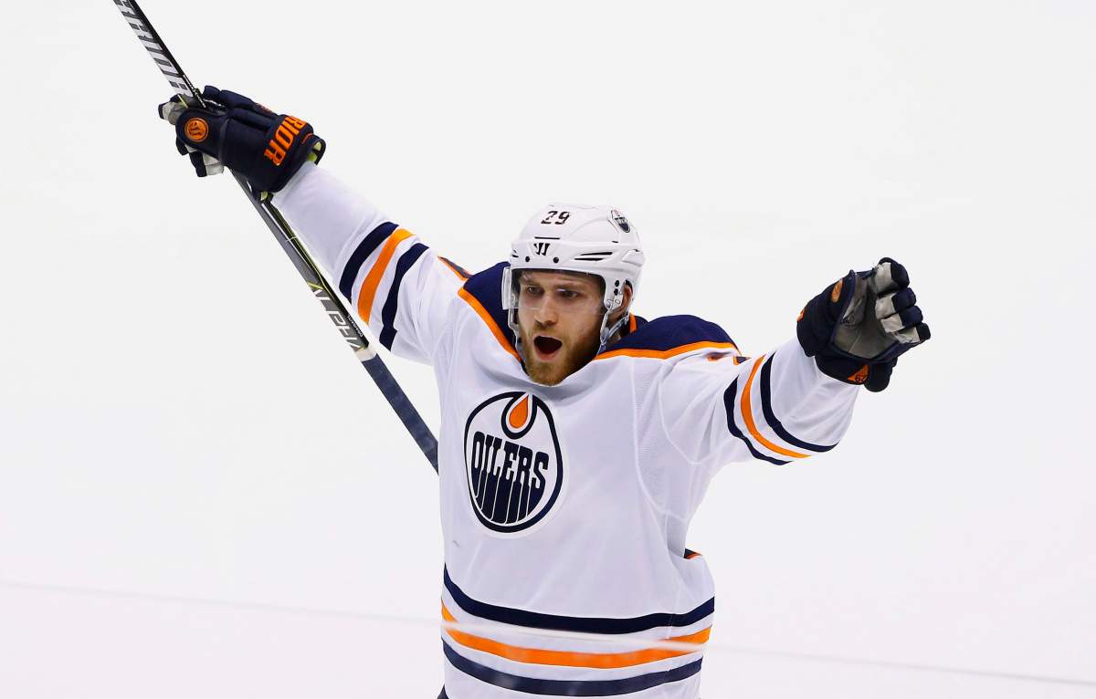 Edmonton Oilers center Leon Draisaitl celebrates a goal by defenseman Darnell Nurse against the Arizona Coyotes, during the third period of an NHL hockey game, Friday, Jan. 12, 2018, in Glendale, Ariz. The Oilers defeated the Coyotes 4-2.