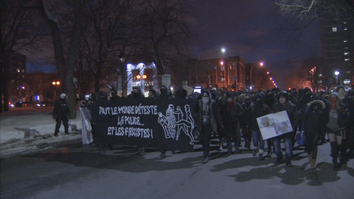 Protesters take to the streets of Montreal in annual police anti-brutality march. Thursday, March 15, 2018.