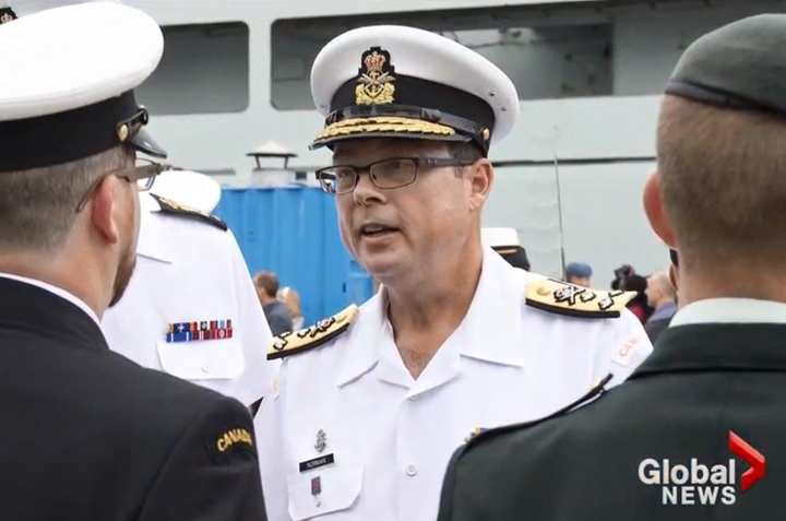 Vice-Admiral Mark Norman has been charged with breach of trust over an alleged shipbuilding leak.