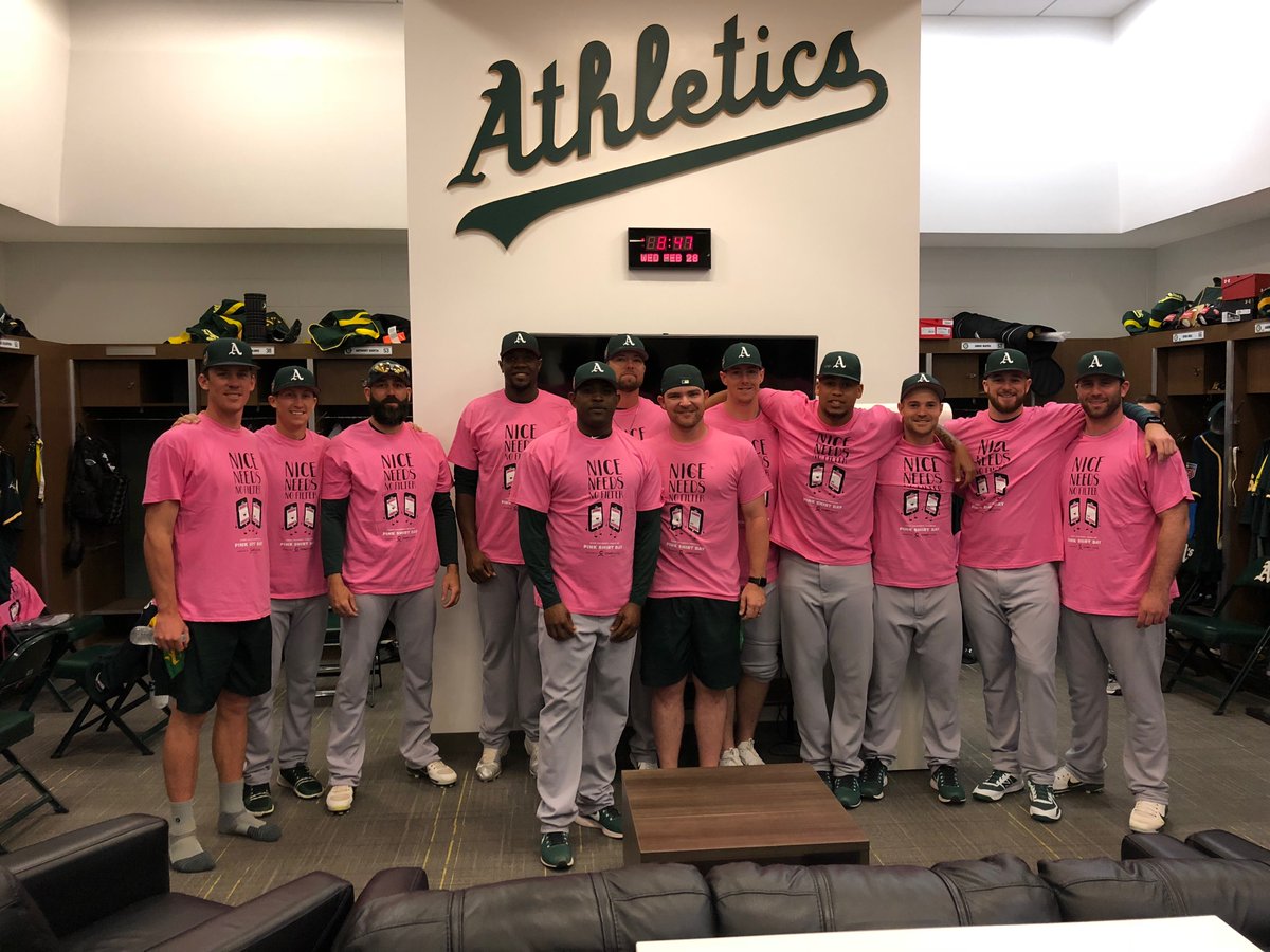 Players with the MLB Oakland Athletics donned "Nice needs no filter" shirts in support of Pink Shird Day on Wednesday.