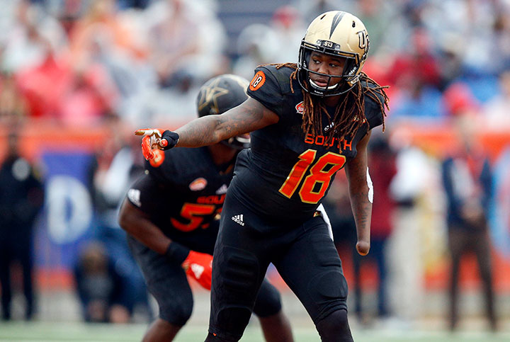 In this Jan. 27, 2018, file photo, South Squad outside linebacker Shaquem Griffin, of Central Florida, gestures during the first half of the Senior Bowl NCAA college football game in Mobile, Ala.